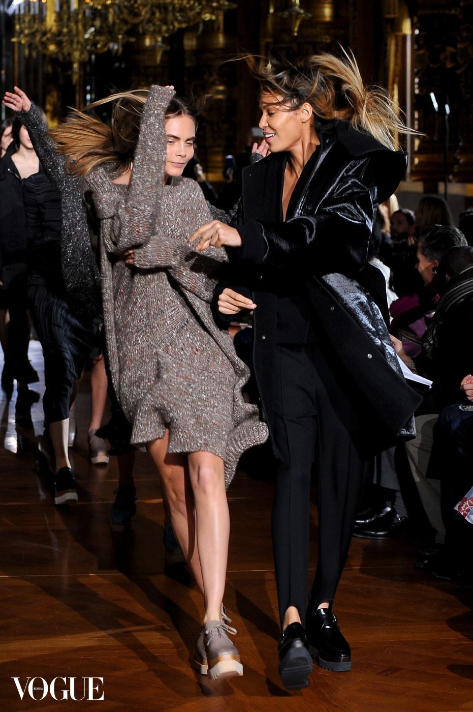 PARIS, FRANCE - MARCH 03:  Joan Smalles and Cara Delevigne walk the runway during the Stella McCartney show as part of the Paris Fashion Week Womenswear Fall/Winter 2014-2015  on March 3, 2014 in Paris, France.  (Photo by Francois Durand/Getty Images)