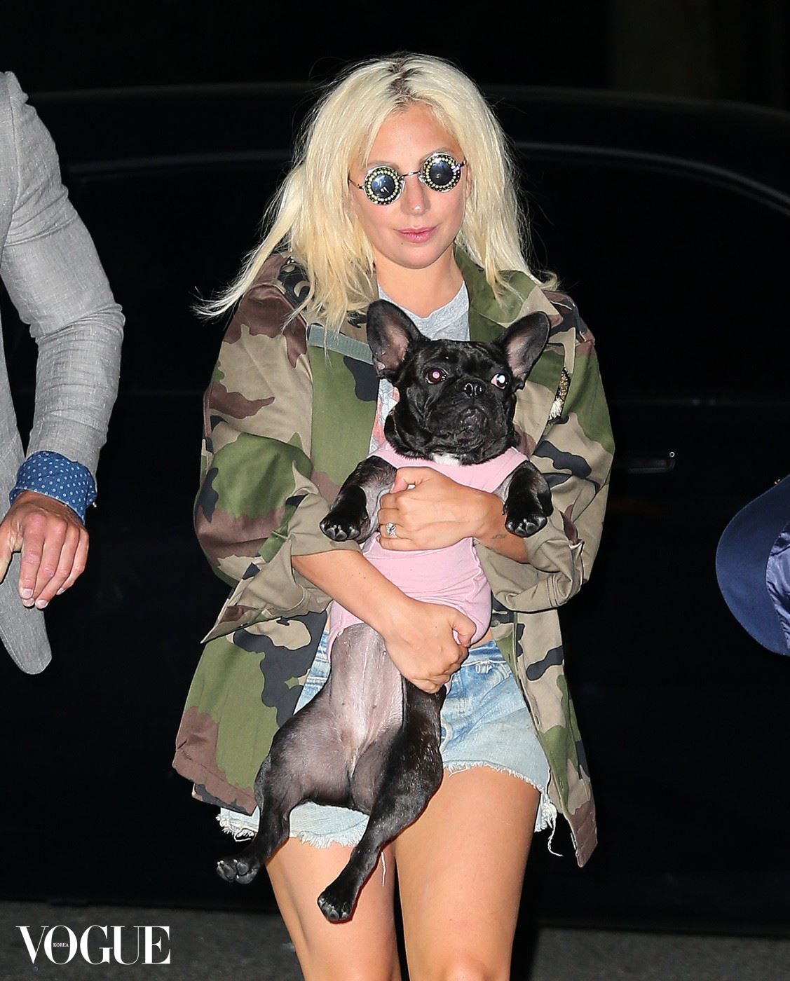 Lady Gaga appears to stumble down the stairs while departing her show at Radio City in NYC with her dog Asia. Pictured: Lady Gaga Ref: SPL1060433  220615   Picture by: XactpiX / Splash News Splash News and Pictures Los Angeles:	310-821-2666 New York:	212-619-2666 London:	870-934-2666 photodesk@splashnews.com 