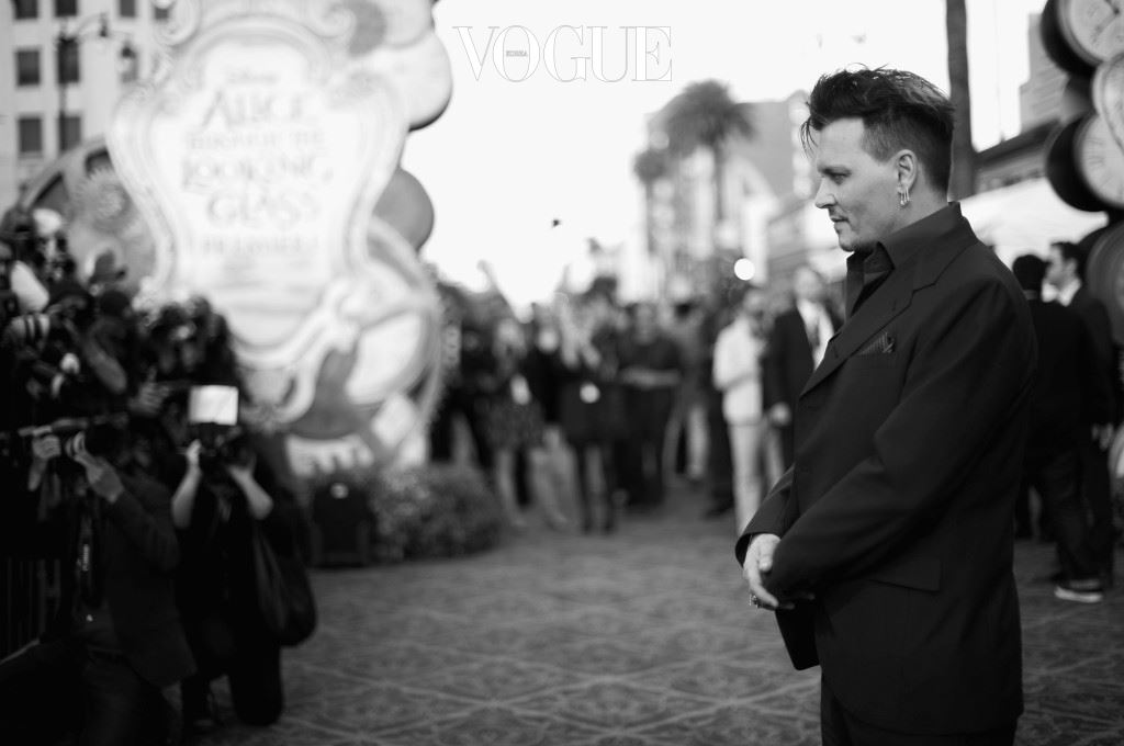 HOLLYWOOD, CA - MAY 23:  (EDITORS NOTE: Image has been shot in black and white. Color version not available.) Actor Johnny Depp attends Disneys 'Alice Through the Looking Glass' premiere with the cast of the film, which included Johnny Depp, Anne Hathaway, Mia Wasikowska and Sacha Baron Cohen at the El Capitan Theatre on May 23, 2016 in Hollywood, California.  (Photo by Charley Gallay/Getty Images for Disney)