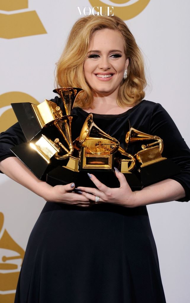 LOS ANGELES, CA - FEBRUARY 12:  Singer Adele, winner of the GRAMMYs for Record of the Year for "Rolling In The Deep", Album of the Year for "21", Song of the Year for "Rolling In The Deep", Best Pop Solo Performance for "Someone Like You", Best Pop Vocal Album for "21" and Best Short Form Music Video for "Rolling In The Deep", poses in the press room at the 54th Annual GRAMMY Awards at Staples Center on February 12, 2012 in Los Angeles, California.  (Photo by Kevork Djansezian/Getty Images)