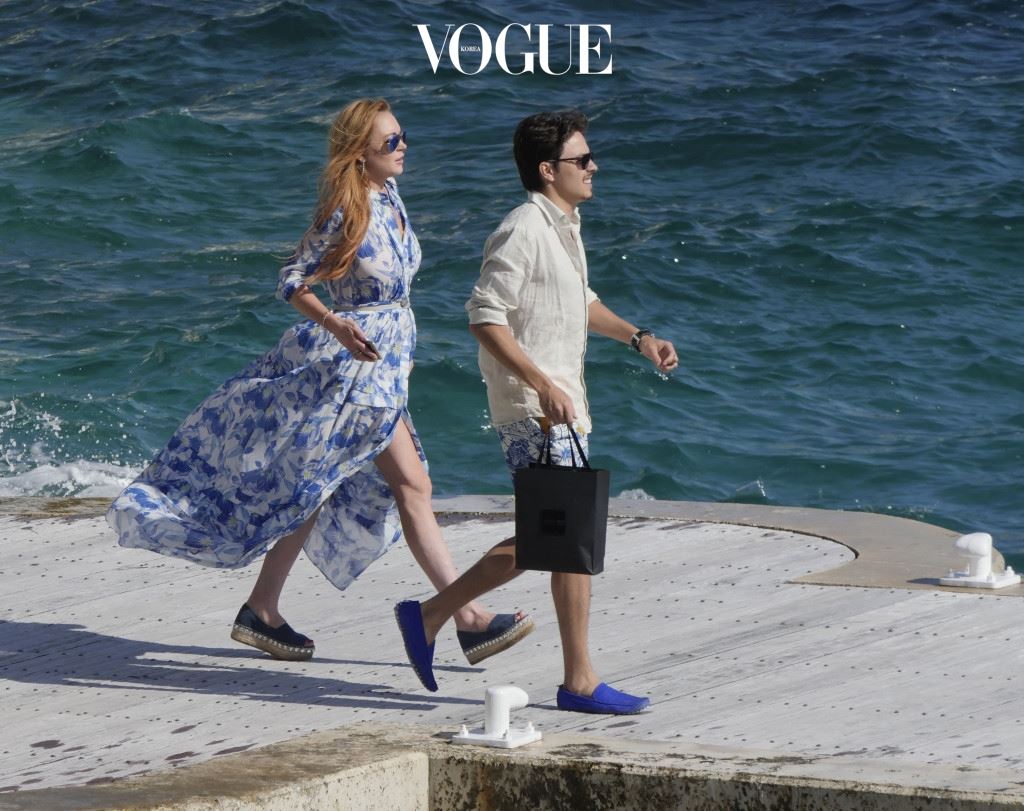 Lindsay Lohan and boyfriend Egor Tarabasov seen outside the Eden Roc Hotel in Cannes, France. The pair arrived by boat and ran into Harvey Weinstein on the dock. Pictured: Lindsay Lohan, Egor Tarabasov Ref: SPL1288024  210516   Picture by: Splash News Splash News and Pictures Los Angeles:310-821-2666 New York:212-619-2666 London:870-934-2666 photodesk@splashnews.com 