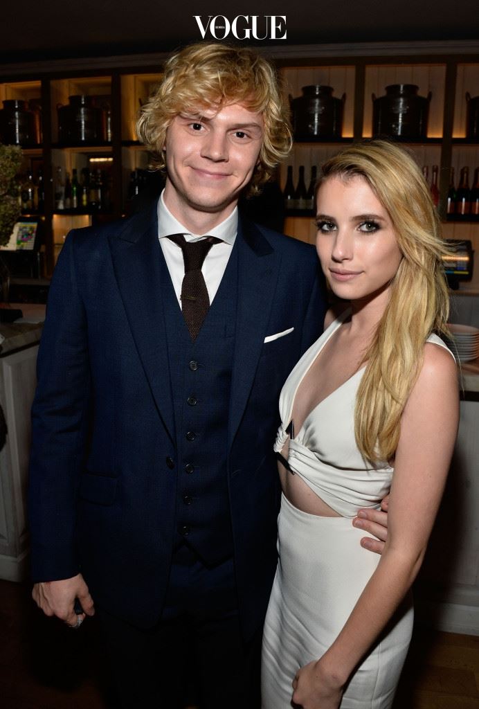 WEST HOLLYWOOD, CA - OCTOBER 05:  Actors Evan Peters and Emma Roberts  attend the Premiere Of FX's "American Horror Story: Coven" after party at Fig & Olive Melrose Place on October 5, 2013 in West Hollywood, California.  (Photo by Frazer Harrison/Getty Images)