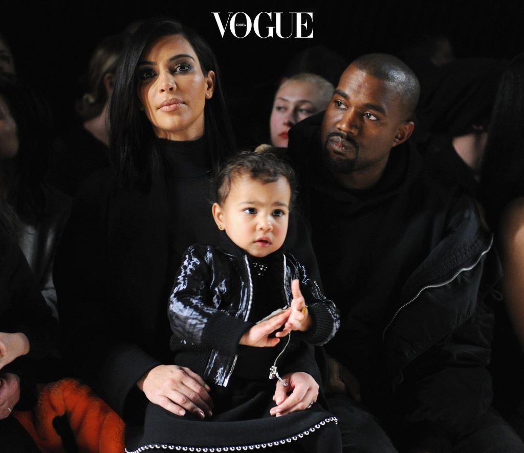 NEW YORK, NY - FEBRUARY 14:  (L-R) Kim Kardashian, North West and Kanye West attend the Alexander Wang Fashion Show during Mercedes-Benz Fashion Week Fall 2015 at Pier 94 on February 14, 2015 in New York City.  (Photo by Craig Barritt/Getty Images)