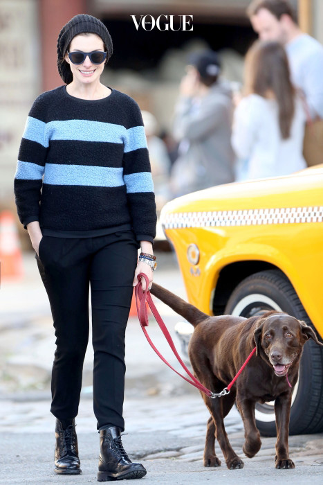 UK CLIENTS MUST CREDIT: AKM-GSI ONLY Anne Hathaway takes a stroll with her husband Adam Shulman, a friend, and her two dogs in New York, NY. The actress tried to go unseen by wearing a large black beanie, black sunglasses, and dressed in an edgy stripe sweater, and black skinnies tucked into her combat boots. Pictured: Anne Hathaway Ref: SPL842813  140914   Picture by: AKM-GSI / Splash News 