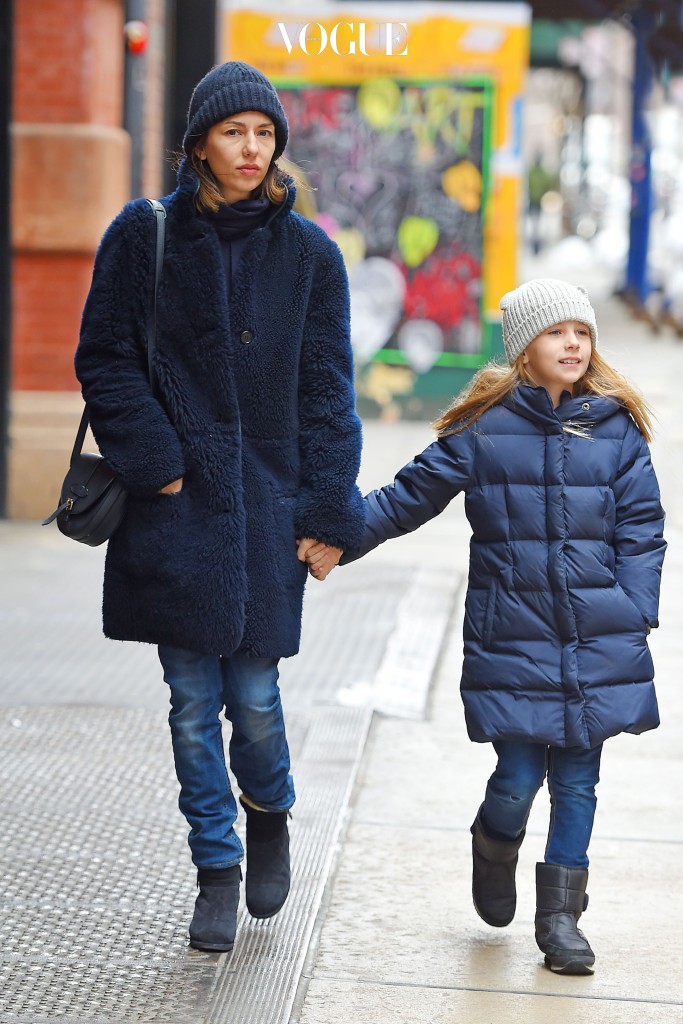 UK CLIENTS MUST CREDIT: AKM-GSI ONLY Director Sofia Coppola stepped out in SoHo with her daughter Romy on Monday afternoon, bundled for the freezing New York weather. Romy was dressed like Sofia's little mini-me in a beanie, navy blue coat, jeans and black boots. Pictured: Sofia Coppola and Romy Mars Ref: SPL931384  190115   Picture by: AKM-GSI / Splash News 