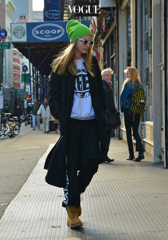 Cara Delevingne wears casual sweatpants, Timberland boots and a neon green beanie hat as she heads into a downtown NYC office building. Pictured: Cara Delevingne Ref: SPL653150  191113   Picture by: Tom Meinelt / Splash News Splash News and Pictures Los Angeles:310-821-2666 New York:212-619-2666 London:870-934-2666 photodesk@splashnews.com 