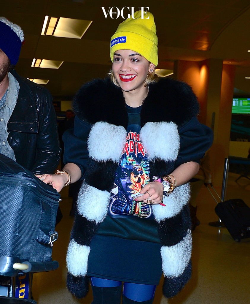 Rita Ora greets fans after fresh faced NYC arrival