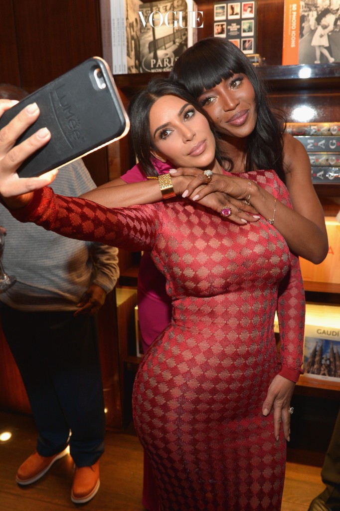 BEVERLY HILLS, CA - APRIL 28:  TV personality Kim Kardashian and model Naomi Campbell take a selfie during the Los Angeles launch of "Naomi" at Taschen Beverly Hills on April 28, 2016 in Beverly Hills, California.  (Photo by Charley Gallay/Getty Images for Taschen)
