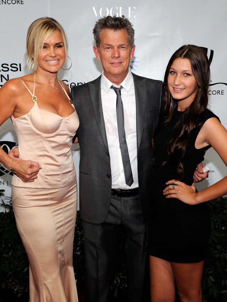 LAS VEGAS - OCTOBER 09:  Yolanda Hadid, musician/music producer David Foster, and Bella Hadid arrive at the Andre Agassi Foundation for Education's 15th Grand Slam for Children benefit concert at the Wynn Las Vegas October 9, 2010 in Las Vegas, Nevada. The event raises funds to help improve education for underserved youth in the Las Vegas community.  (Photo by Ethan Miller/Getty Images)