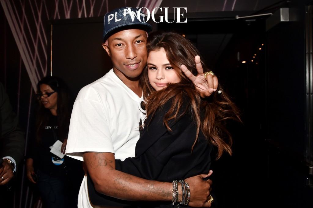 INGLEWOOD, CALIFORNIA - APRIL 03:  Recording artists Pharrell Williams (L) and Selena Gomez poses in the broadcast room during the iHeartRadio Music Awards at The Forum on April 3, 2016 in Inglewood, California.  (Photo by Alberto E. Rodriguez/Getty Images for iHeartRadio / Turner)