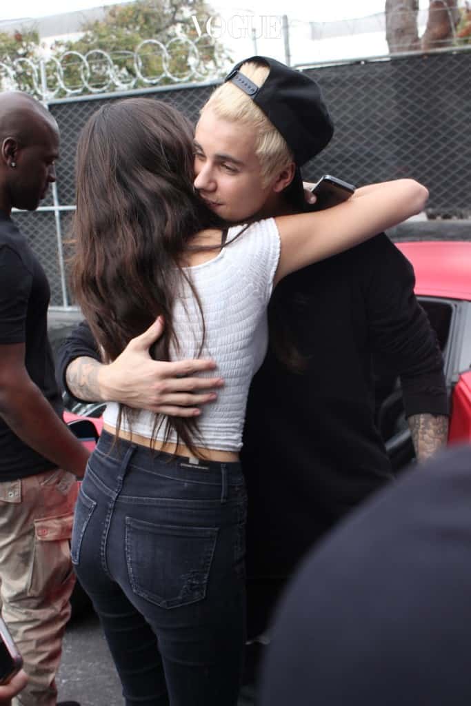 Justin Bieber arrives at West Coast Customs and is greeted by Maddison Beer. While hugging, Madison accidentally knocked off Justin's hat. Also in the back working hard was Corey, (Kris Jenner's new beau). Pictured: Justin Bieber and Madison Beer Ref: SPL906042  071214   Picture by: Khrome / Splash News Splash News and Pictures Los Angeles:310-821-2666 New York:212-619-2666 London:870-934-2666 photodesk@splashnews.com 