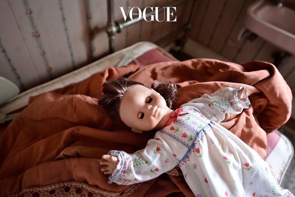 HARROGATE, ENGLAND - SEPTEMBER 04: A doll in one of the bedrooms in Pineheath house on September 4, 2013 in Harrogate, England. The untouched 40-bedroom house belonged to wealthy Indian-born aristocrats Sir Dhunjibhoy and Lady Bomanji, who were well-known figures in British high society at the start of the 20th century and were friends of the Royal Family. Sir Dhunjibhoy was a Bombay-based shipping magnate who also used his wealth to support Britain's war effort against the Nazis which led to him being knighted. Their 12-bathroom mansion in Harrogate was where they spent each autumn after staying at their house in Windsor during the summer and spending the winters in Poona, India. The mansion has been sold in a multi-million pound sale to a local businessman who plans to make it a family home again after Lady Bomanjis' daughter, Mrs Mehroo Jehangir, died in 2012 having not touched it since 1986, when her mother died. (Photo by Bethany Clarke/Getty Images)