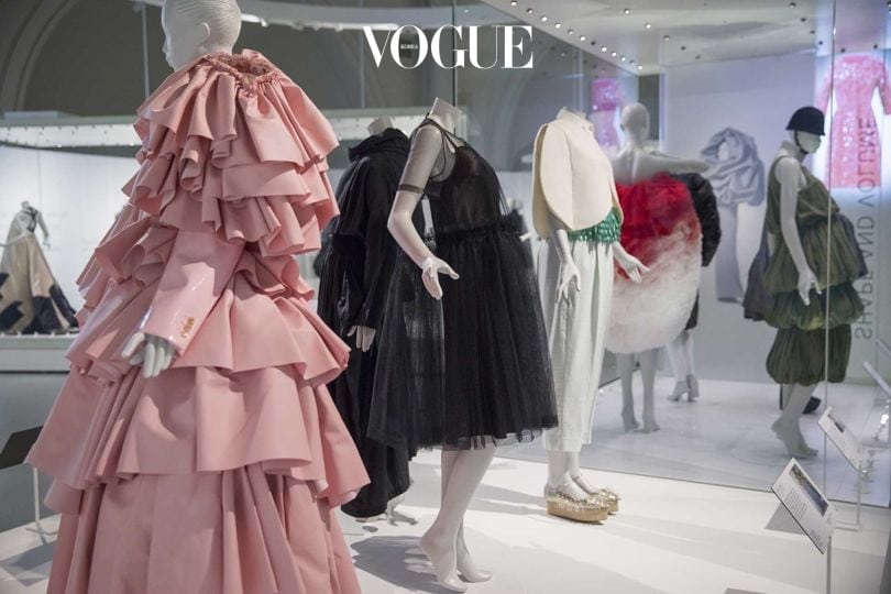 View of an installation at the "Balenciaga: Shaping Fashion" exhibition, showing his influence on generations of designers including Rei Kawakubo of Comme des Garçons (front left, in pink)