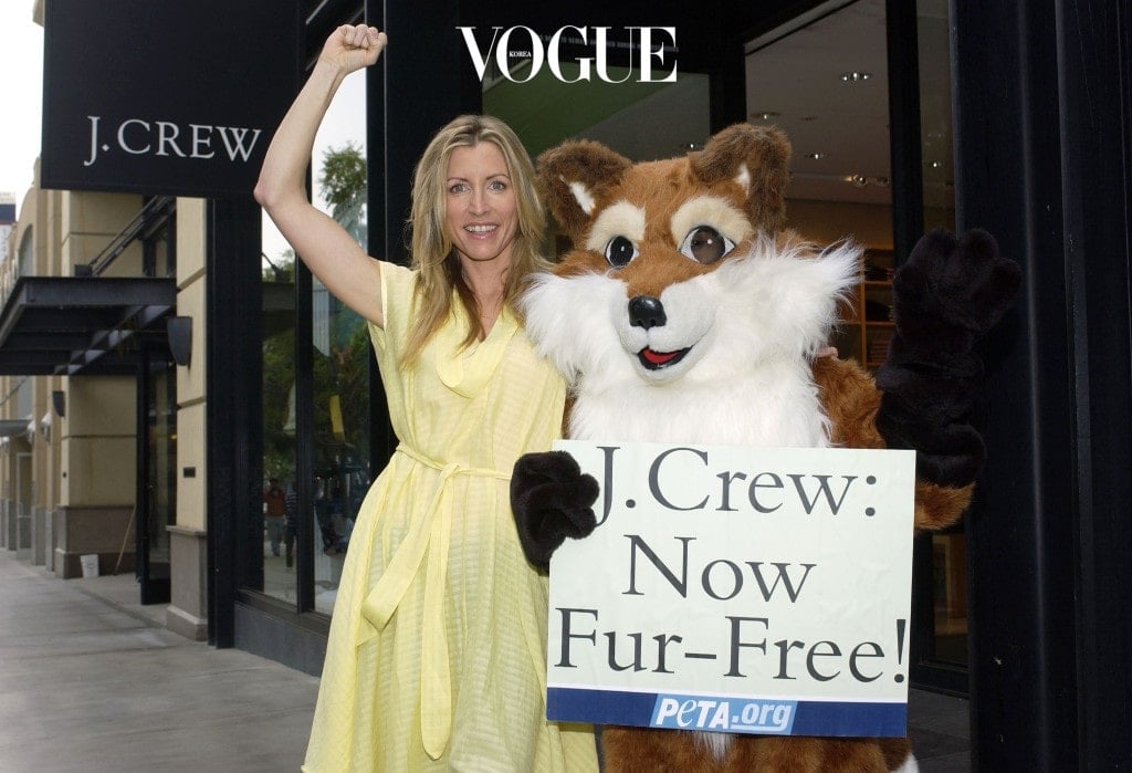 SANTA MONICA, CA - DECEMBER 1:  Animal rights activistm, Heather Mills McCartney, gestures while leading a PETA celebration as retailer J.Crew ends fur sales on December 1, 2005 in Santa Monica, California. McCartney helped launch an 11-week boycott campaign with a protest outside J. Crew's Madison Avenue store in New York on September 12.  (Photo by Amanda Edwards/Getty Images)
