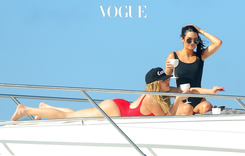 EXCLUSIVE: **PREMIUM EXCLUSIVE RATES APPLY** Khloe Kardashian and Kendall Jenner play around and take selfies on a boat in St Bart's