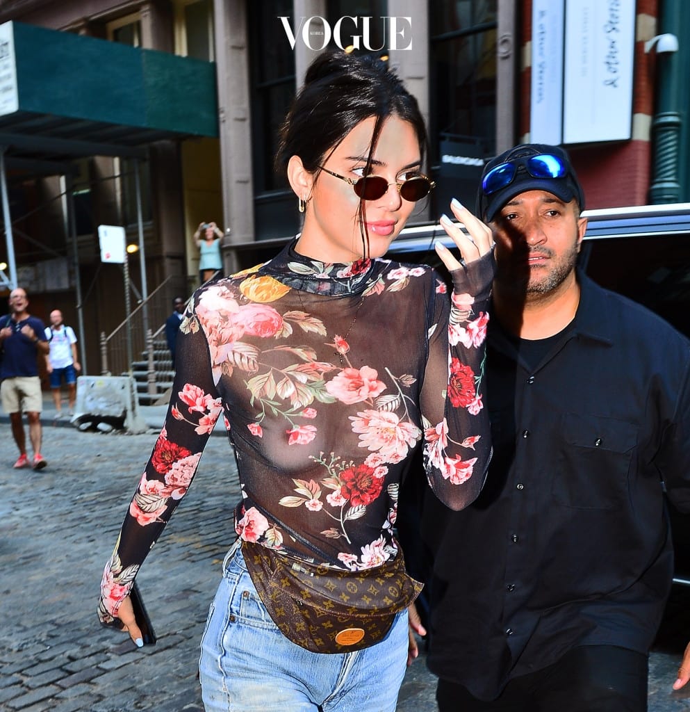 Kendall Jenner is all smiles rocking a see through floral top as she arrives at her hotel in NYC Pictured: Kendall Jenner Ref: SPL1548152  310717   Picture by: Splash News Splash News and Pictures Los Angeles:310-821-2666 New York:212-619-2666 London:870-934-2666 photodesk@splashnews.com 