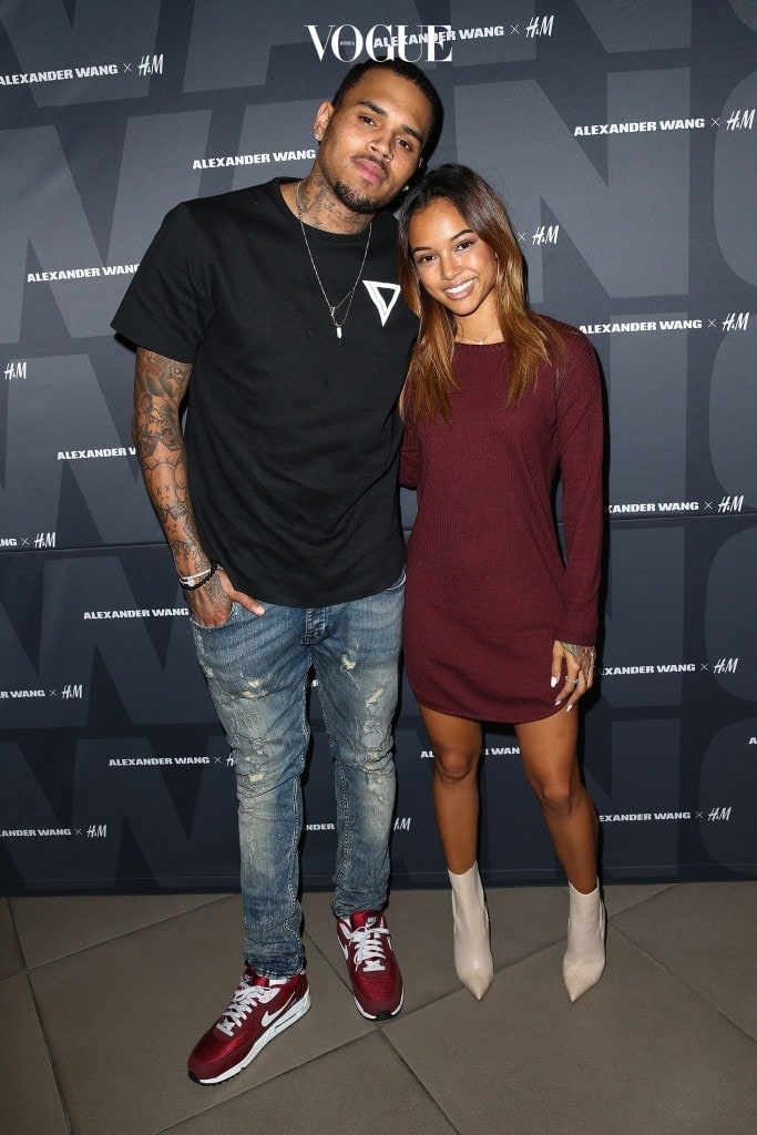 WEST HOLLYWOOD, CA - NOVEMBER 05:  Recording artist Chris Brown (L) and model Karrueche Tran attend the Alexander Wang x H&M Pre-Shop Party at H&M on November 5, 2014 in West Hollywood, California.  (Photo by Imeh Akpanudosen/Getty Images for H&M)