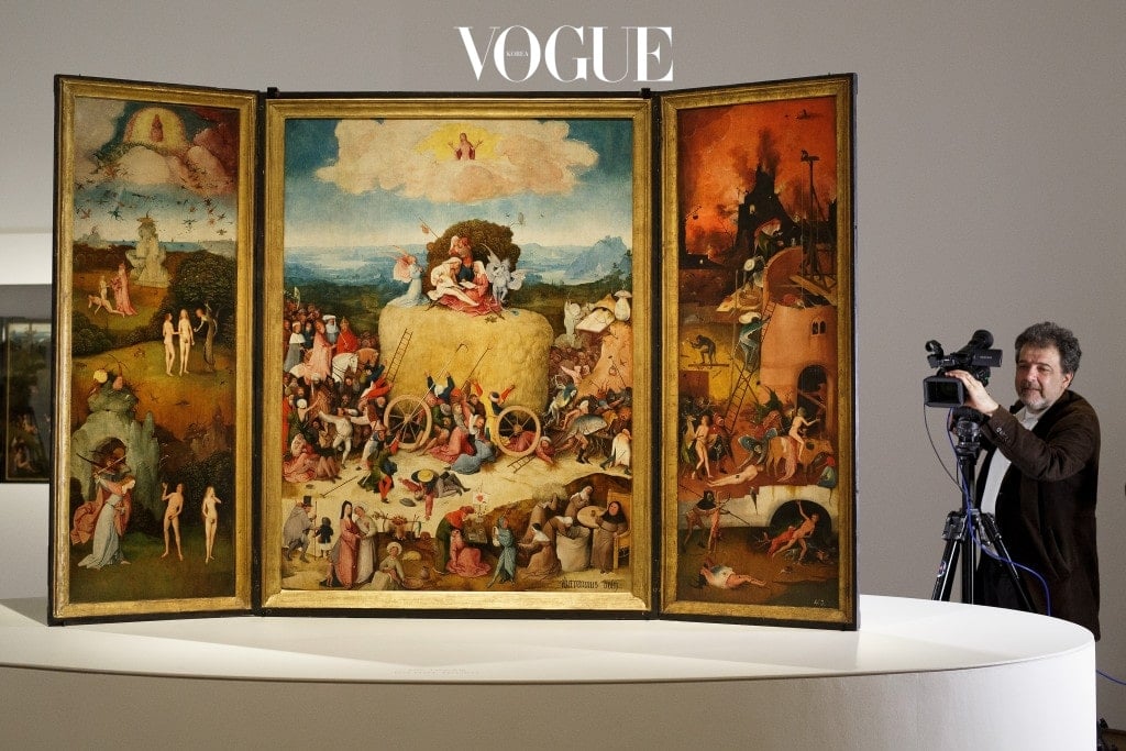 MADRID, SPAIN - MAY 27:  A cameraman records 'The Haywain Triptych' by Dutch painter Hieronymus Bosch during a press preview of the 'El Bosco' 5th Centenary Anniversary Exhibition at El Prado Museum on May 27, 2016 in Madrid, Spain. The Prado Museum will host the exhibition celebrating the work of Dutch painter Hieronymus Bosch to mark 500 years since his death in 1516. It consists of sixty-five works of art loaned by collections based all over the world, and will be open to the public by May 31 until Septembr 11, 2016.  (Photo by Pablo Blazquez Dominguez/Getty Images)