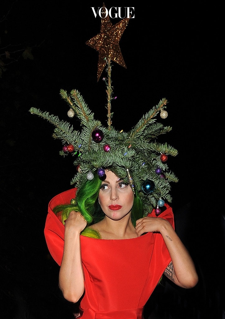 Lady Gaga wearing a red dress and a Christmas tree on her head as she arrives back at The Langham Hotel after performing at the Jingle Bell Ball.  Pictured: Lady Gaga Ref: SPL664657  081213   Picture by: Gotcha Images / Splash News Splash News and Pictures Los Angeles:310-821-2666 New York:212-619-2666 London:870-934-2666 photodesk@splashnews.com 